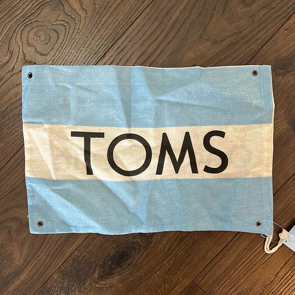 Toms Handbags - NWT TOMS shoes flag / storage bag